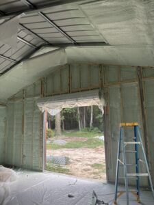 Closed cell spray foam installed in a metal building in Asheville, North Carolina.